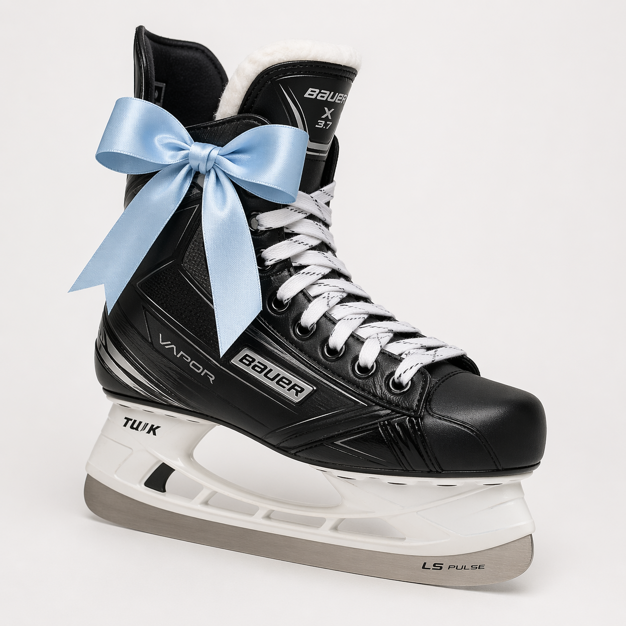 Hockey skate with light blue bow